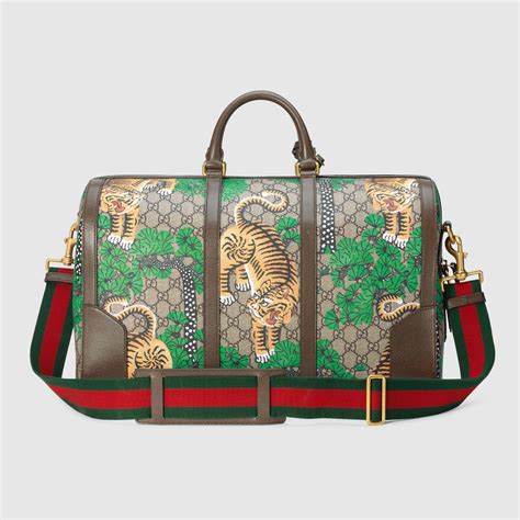 gucci tiger duffle bag|gucci duffle bag for women.